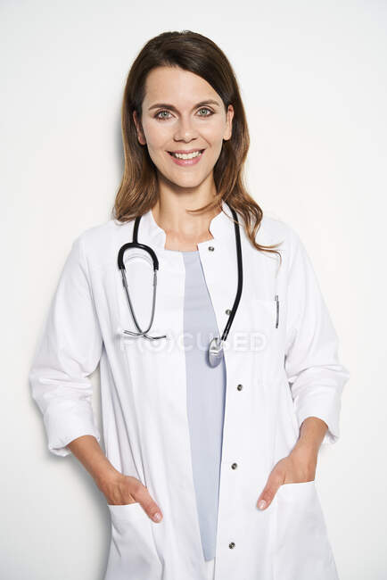 Portrait of smiling female doctor with stethoscope — Stock Photo