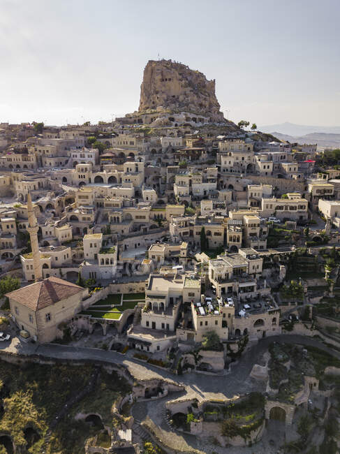 Aerial view of buildings by Uchisar castle against sky at Cappadocia, Turkey — Stock Photo