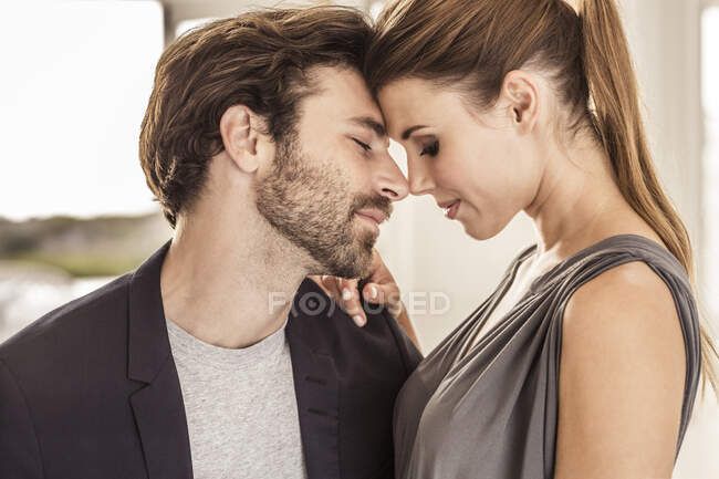 Portrait of affectionate young couple — Stock Photo