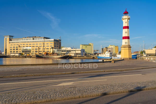 Malmo old light house by harbor in Sweden against blue sky — Stock Photo