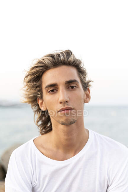 Portrait of handsome young man outdoors — Stock Photo