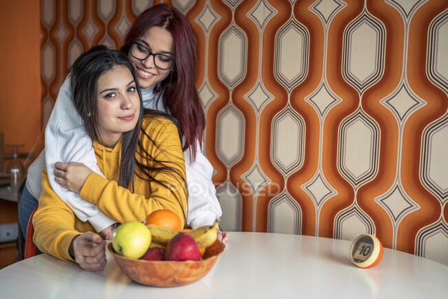 Portrait of two teenage girls at home — Stock Photo