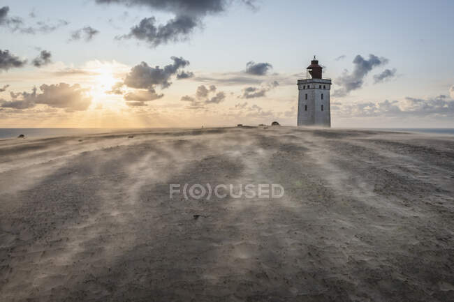 Denmark, Lonstrup, Rubjerg Knude Lighthouse at sunset — Stock Photo