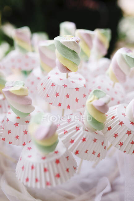 Italy, Close-up of pastel colored marshmallows on party table — Stock Photo