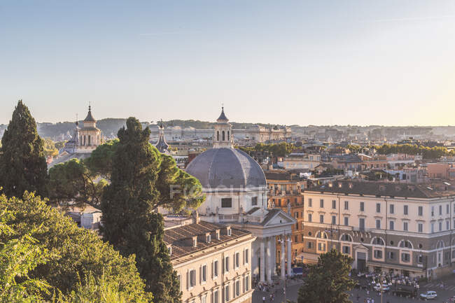 Italy, Rome, Santa Maria in Montesanto church and surrounding city buildings — Stock Photo