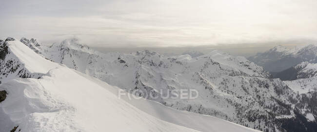 Panorama of high snowy mountain ridges, Lombardy, Valtellina, Italy — Stock Photo