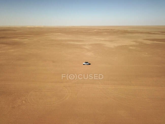 Mauritania, Banc dArguin National Park, Aerial view of off road car driving through desert — Stock Photo