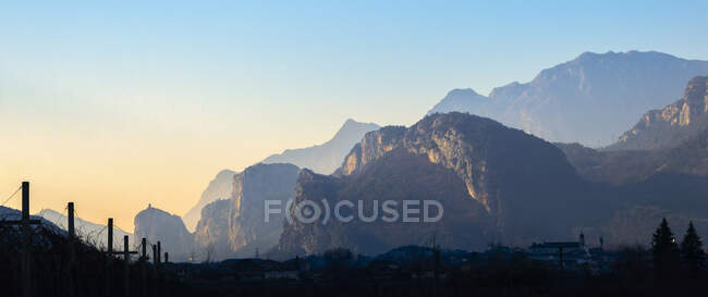 Italy, Trentino, Lake Garda, Riva del Garda at sunrise in Winter — Stock Photo