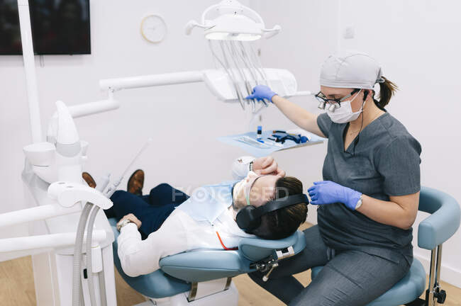 Man receiving dental treatment — Stock Photo