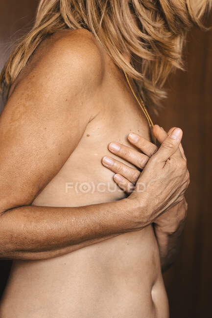 Man Touching Woman Boobs Porn - Close-up of a nude senior woman touching her breast â€” 60s, prevention -  Stock Photo | #472810540