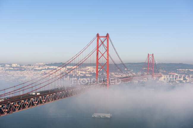 Portugal, Lisbon, 25 de Abril Bridge during foggy weather — Stock Photo
