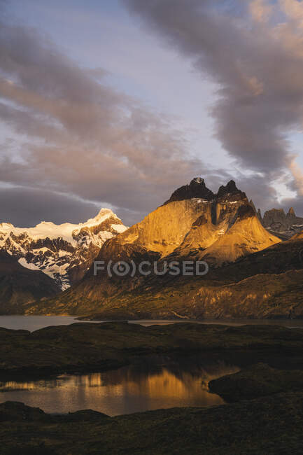 Chile, Lakes at bottom of Cordillera Paine mountain group at dusk — Stock Photo