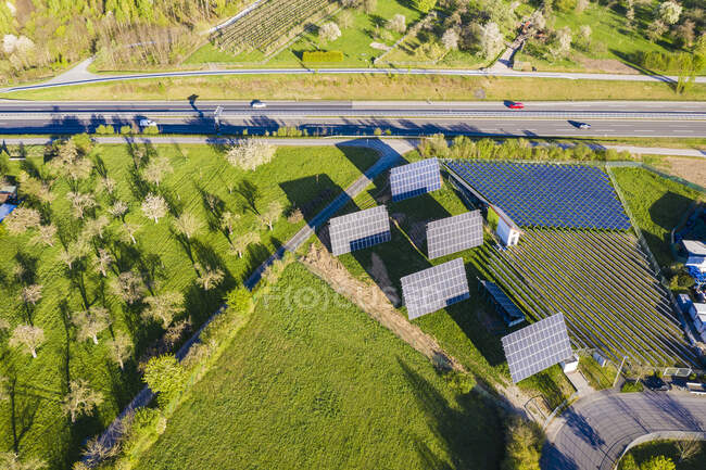Germany, baden-wurttemberg, leutenbach, air view of solar farm by bundesstrasse b14 — стокове фото