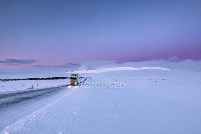 Truck on country road in winter, Tana, Norway — Stock Photo