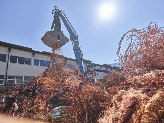 Austria, Tyrol, Brixlegg, Electronic copper wires being recycled in junkyard — Stock Photo