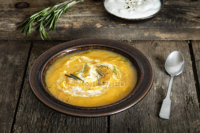 Pumpkin soup with goat cheese — Stock Photo