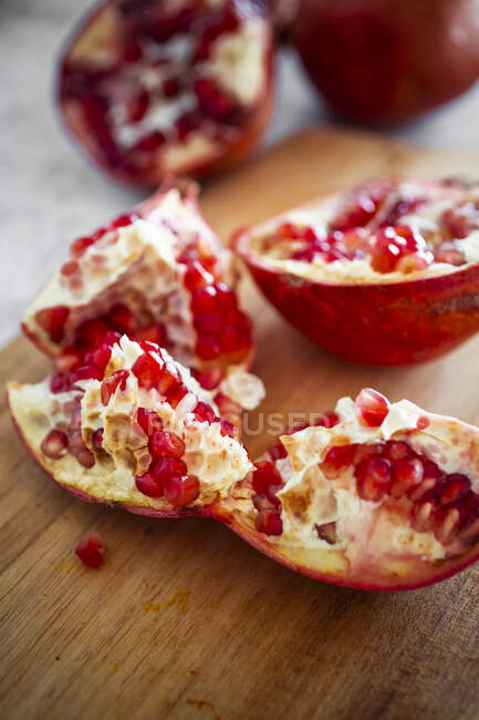 Close-up of quartered pomegranate — Stock Photo