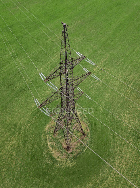 Russia, Aerial view of electricity pylon in field — Stock Photo