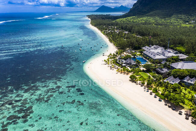 Mauritius, Helicopter view of beach and tourist resort on Le Morne Brabant peninsula in summer — Stock Photo