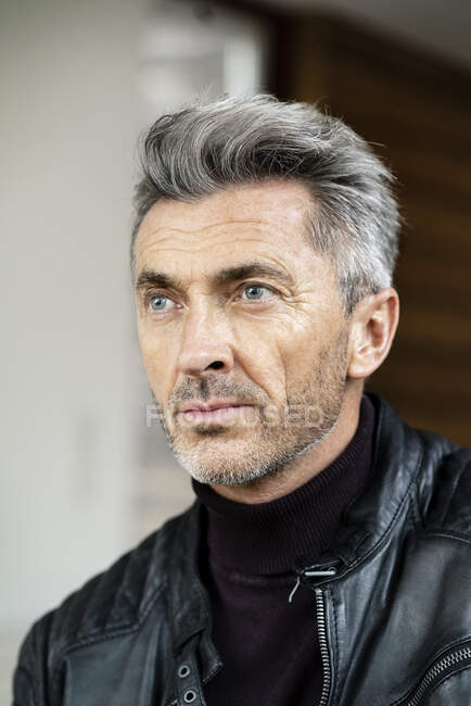 Close-up of thoughtful manager with gray hair looking away in office — people, stubble - Stock Photo | #479913168 Close-up of thoughtful manager with gray hair looking away in office — people, stubble - Stock Photo | #479913168