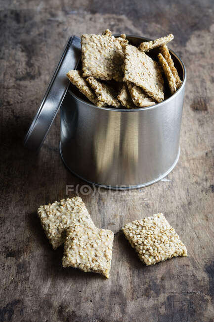 Box of homemade seed crackers — Stock Photo