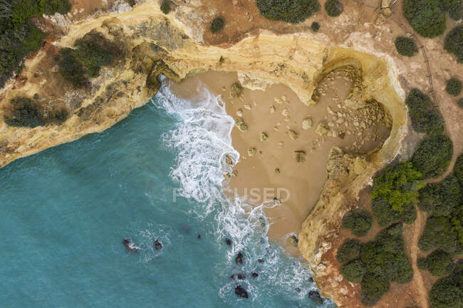 Portugal, Algarve, Lagoa, Drone view of beach and cliffs at Praia da Estaquinha — Stock Photo