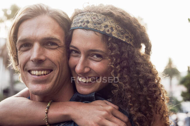Close-up of couple embracing each other on street — Stock Photo