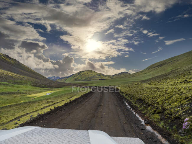 Off-road vehicle on road against sky — Stock Photo
