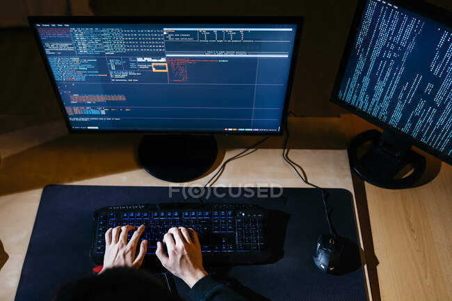Hacker hands working on computer at office — Stock Photo