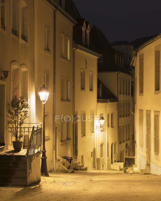Street amidst building at night, Luxembourg City, Luxembourg — Stock Photo