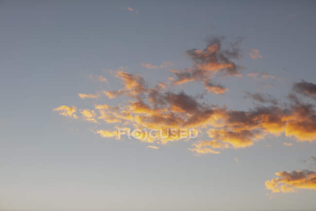 Clouds on sky at sunset — Stock Photo