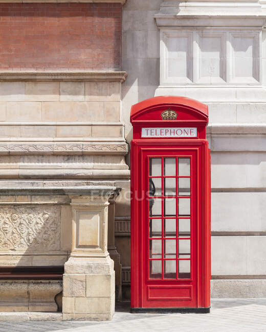 Red telephone booth close — Stock Photo