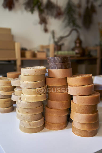 Pile of handmade organic soaps at workshop — Stock Photo