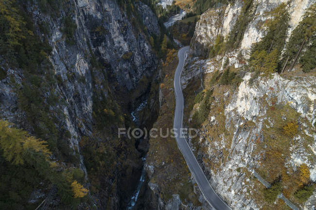 Drone view of steep highway stretching along Albula river gorge — Stock Photo