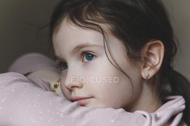 Cute girl with blue eyes looking away — Stock Photo