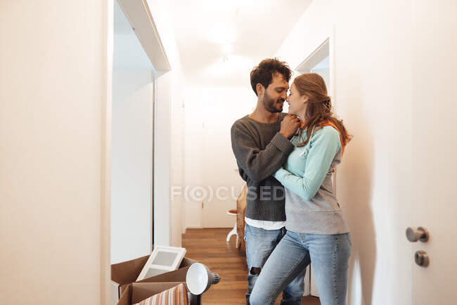 Romantic young couple together at home — Stock Photo