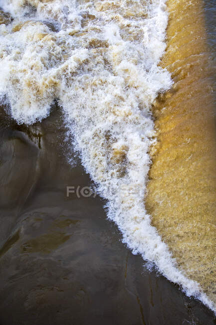 Brown splashing water of river Main — Stock Photo