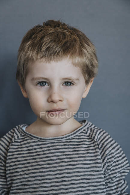 Cute boy against on background — Stock Photo