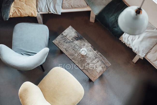 Chairs by wooden table at cafe — Stock Photo