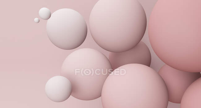Spheres against pink background — Stock Photo
