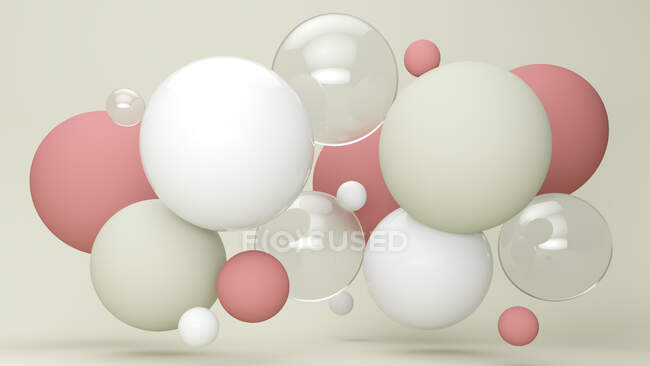 Three dimensional render of pastel colored bubbles floating against green background — Stock Photo