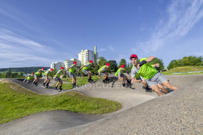 Multiple image of young sportsman skating on pump track — Stock Photo