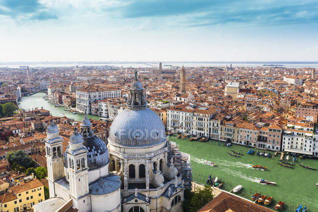 Italy, Veneto, Venice, Aerial view of Grand Canal and Santa Maria Della Salute basilica — Stock Photo
