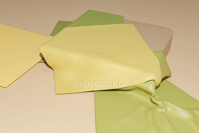 Three dimensional render of green and yellow fabric swatches against beige background — Stock Photo
