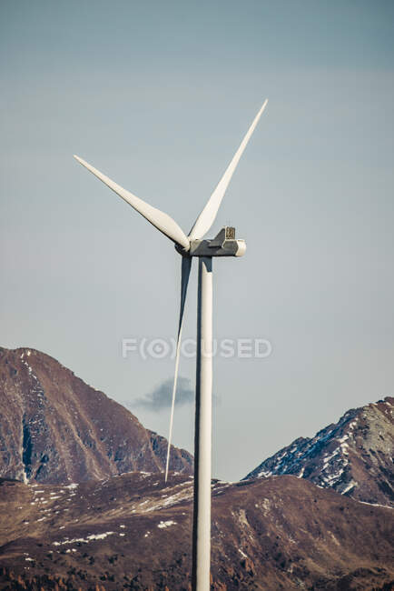 Lone wind turbine standing against mountains in Lachtal — Stock Photo