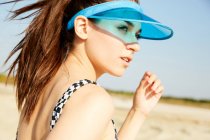 Woman in blue visor — Stock Photo