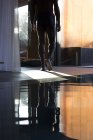 Man walking away from pool — Stock Photo