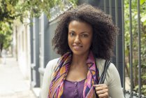 Portrait of Woman with curly hair outdoors — Stock Photo