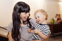 Portrait of smiling Mother and toddler together — Stock Photo