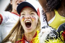 German football fan cheering at match — Stock Photo